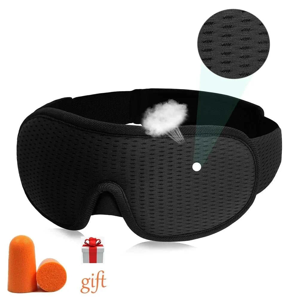 Black breathable 3D sleeping mask with adjustable strap and soft padding for blocking light and comfortable sleep.